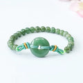 Jade bracelet with safety buckle showing emerald green 6mm star beads in national style design