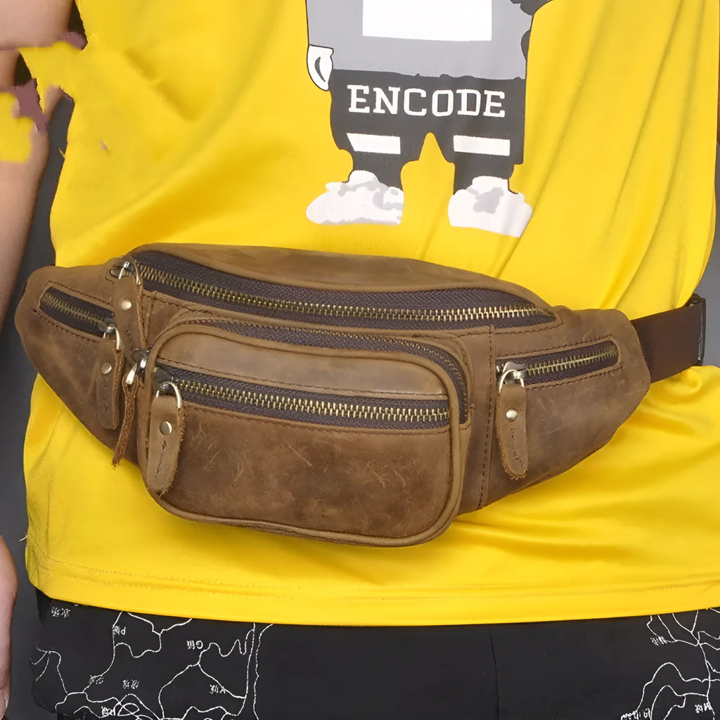 Brown leather shoulder messenger bag with single strap showing dimensions of 32x15x9cm