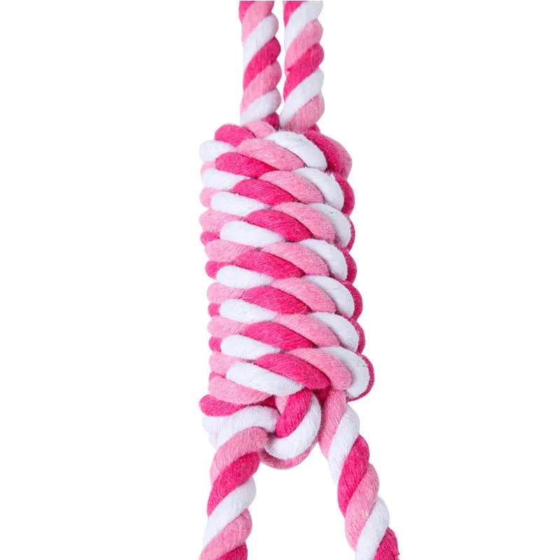 Red, white and blue woven cotton string dog toy measuring 38cm in length
