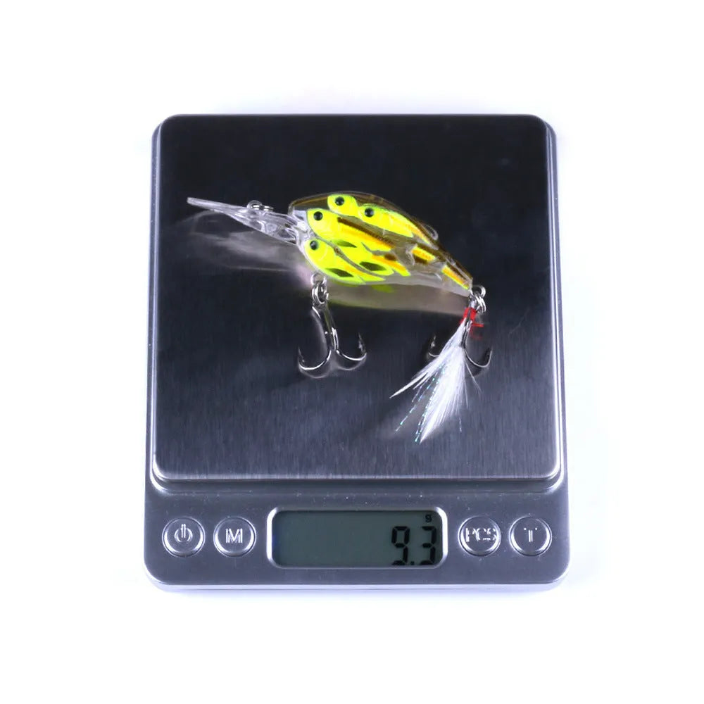 A 7.5 cm long ABS plastic fishing lure with a feather hook, shown in one of nine available colours.