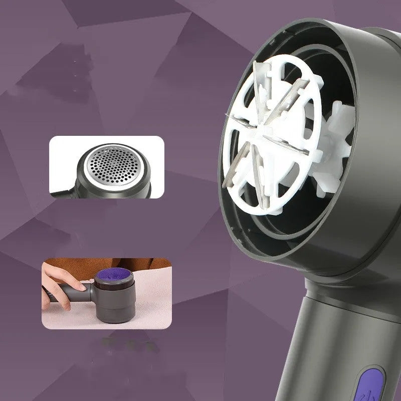 Blue purple electric hairball trimmer with suction and USB charging on a sweater
