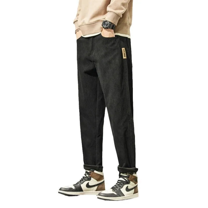 Men's corduroy casual trousers in tapered straight-leg style with mid waist and zip fly