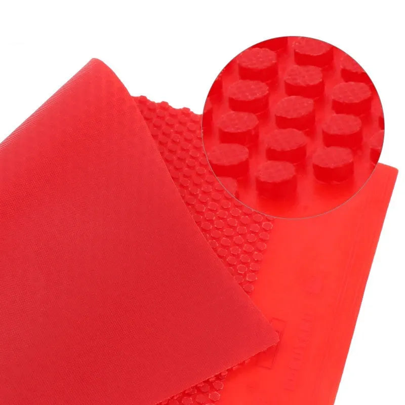 Single uncut sheet of black small particle table tennis racket rubber.