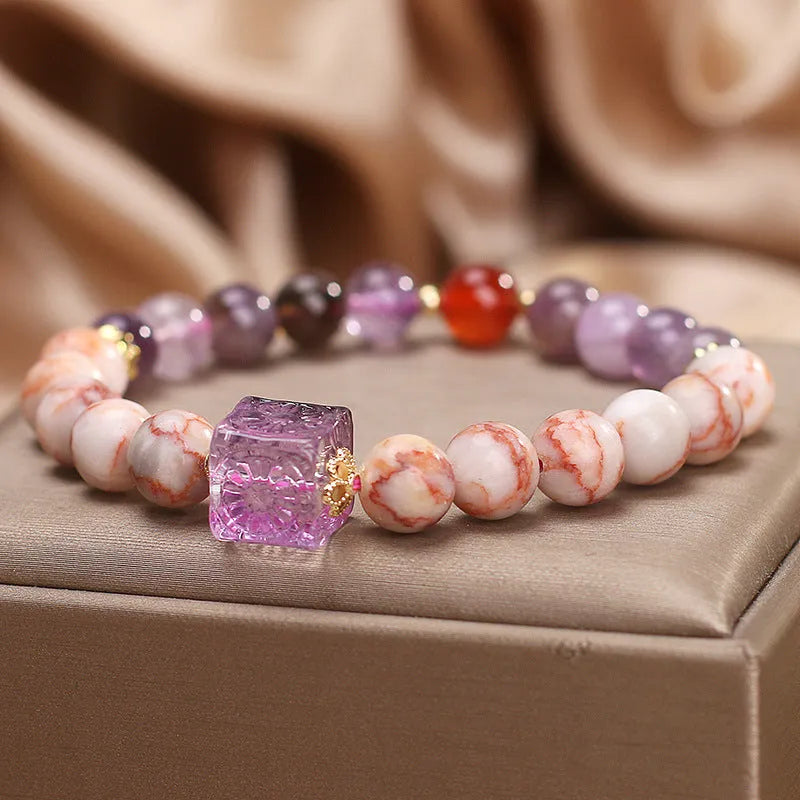 Natural agate bracelet in Amethyst Alashan colour for women, ethnic style on a light background