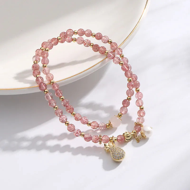 Women's geometric strawberry quartz crystal bracelet for money drawing