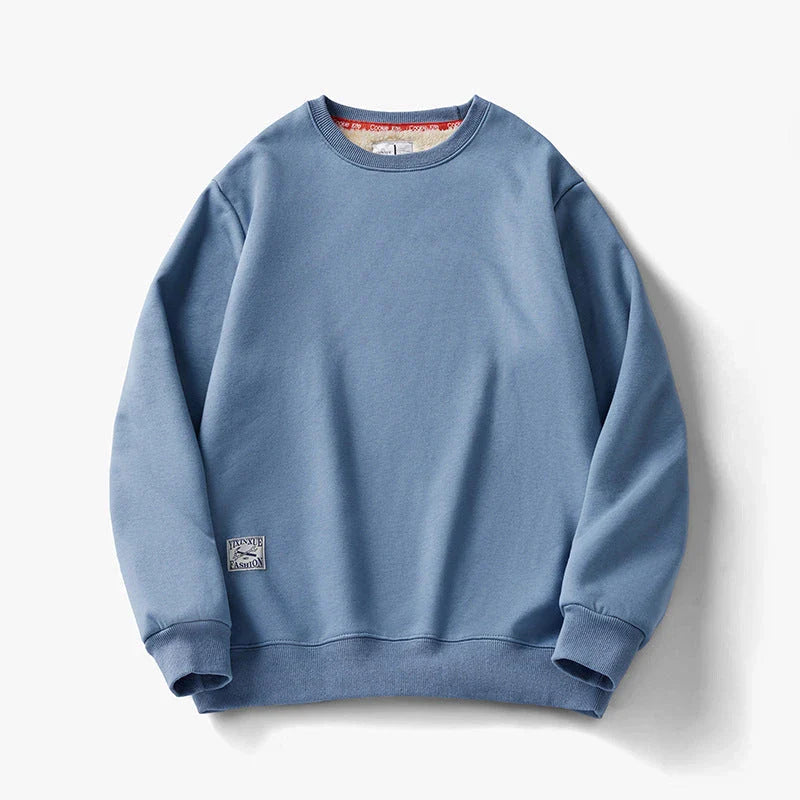 Cozy fleece pullover in various colors for men, featuring a round neckline and long sleeves for warmth and style