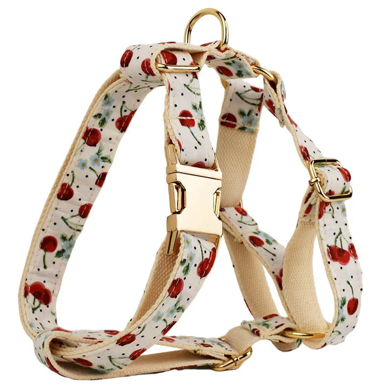 Red cherry printed dog collar and leash set with bow accessory and light gold release buckle