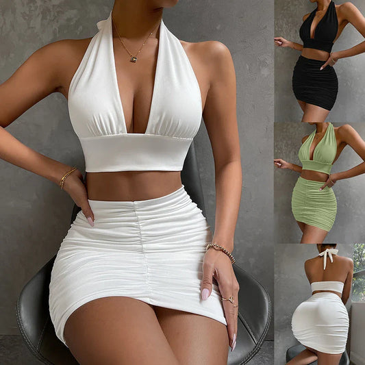 Women's halter lace-up top and pleated skirt set in polyester, available in white, black, and pea green