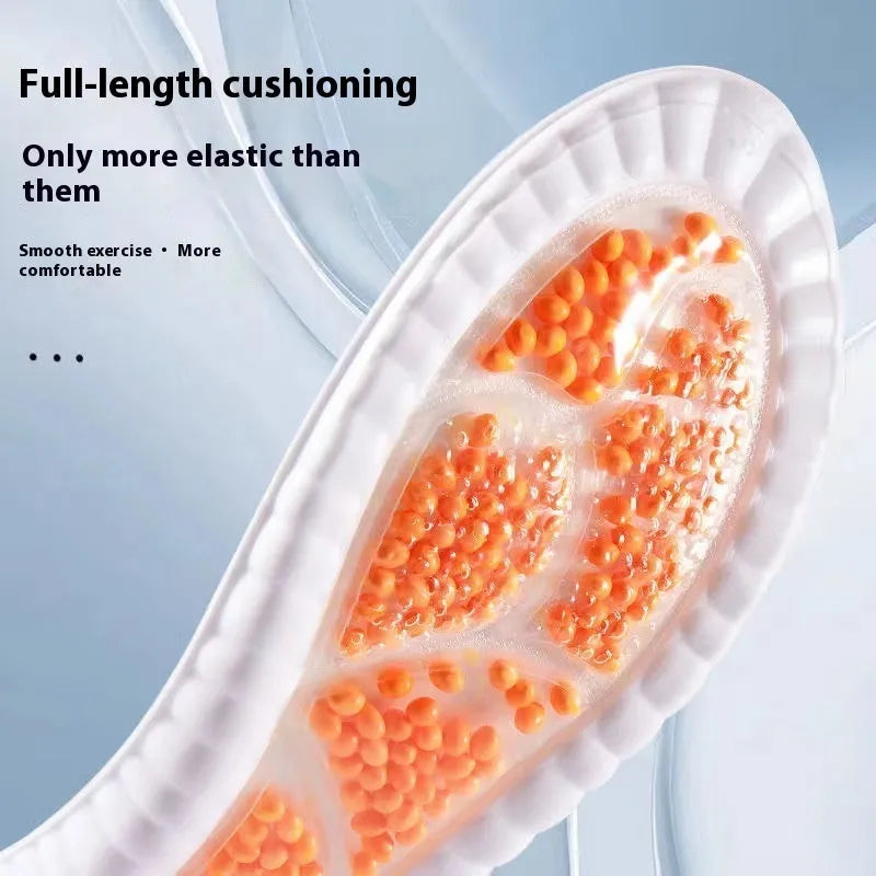 Orange men's sports insole with soft bottom and PU construction on a plain background