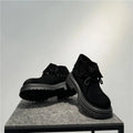 Men's distressed brown cow suede worker ankle boots with thick rubber soles and visible stitching.