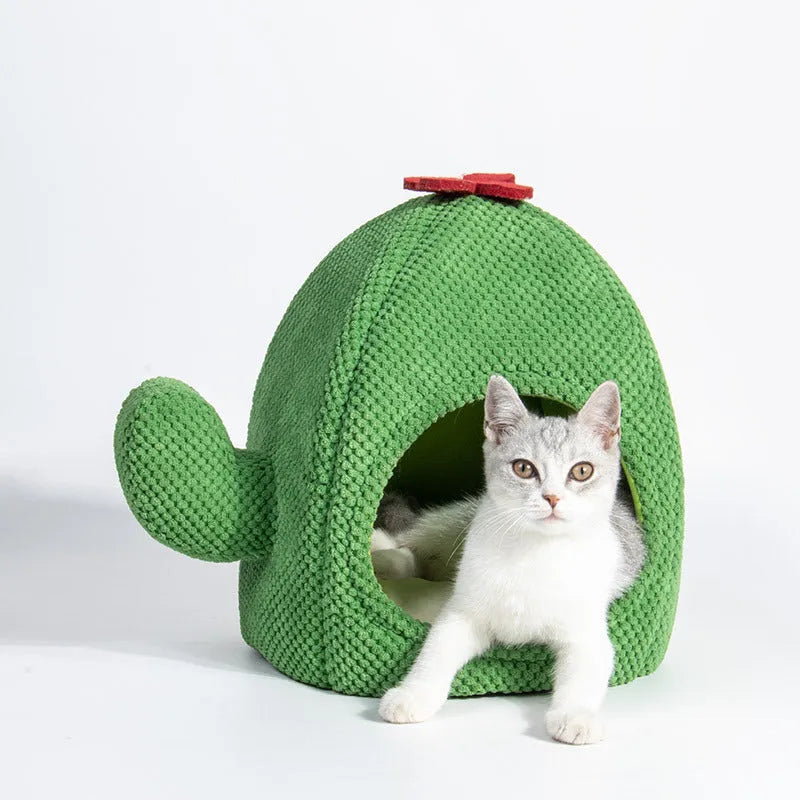 Green enclosed cat cave bed for kittens and small dogs, showing cosy interior.