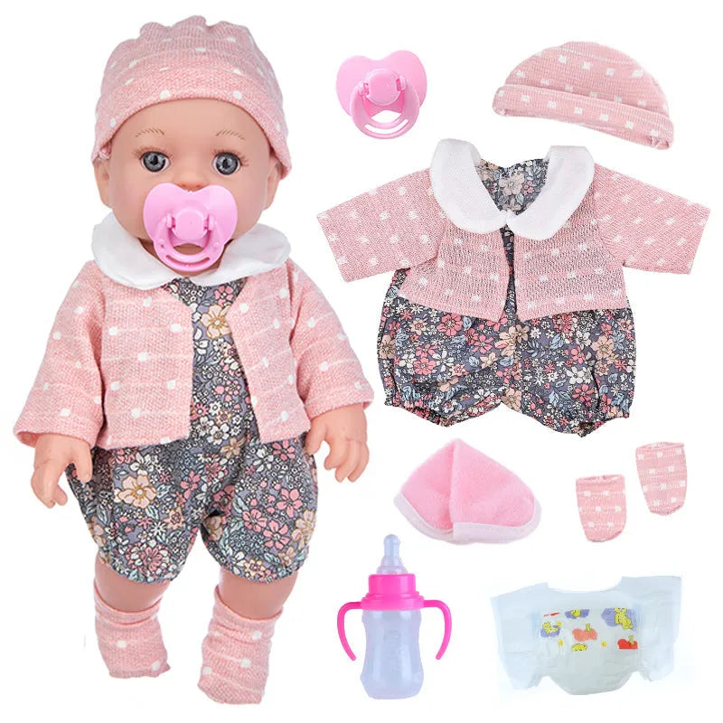 Full vinyl baby doll 30cm with changeable clothes suit in TM-010 colour option, standing on a plain background