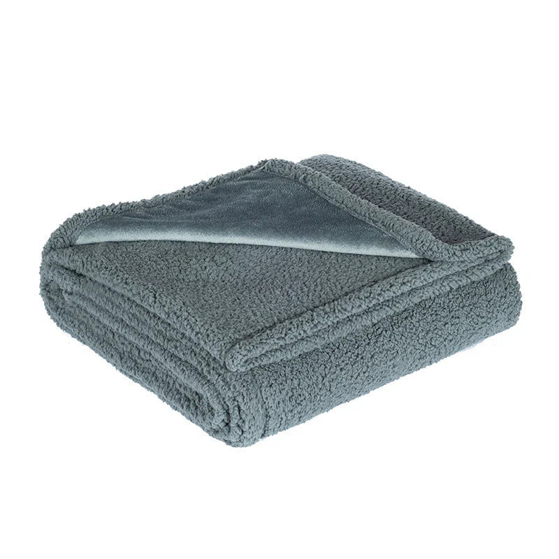 Cozy and comfortable pet blanket for dog kennels, made with flannel, wool, and sherpa for maximum warmth and style
