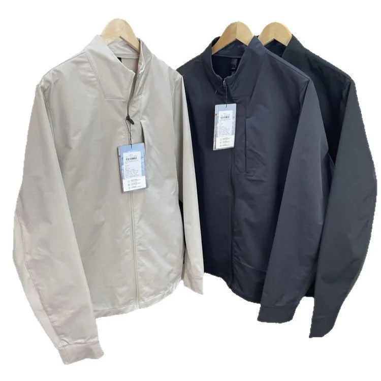 Men's black stand collar casual jacket with long sleeves and a straight hem.