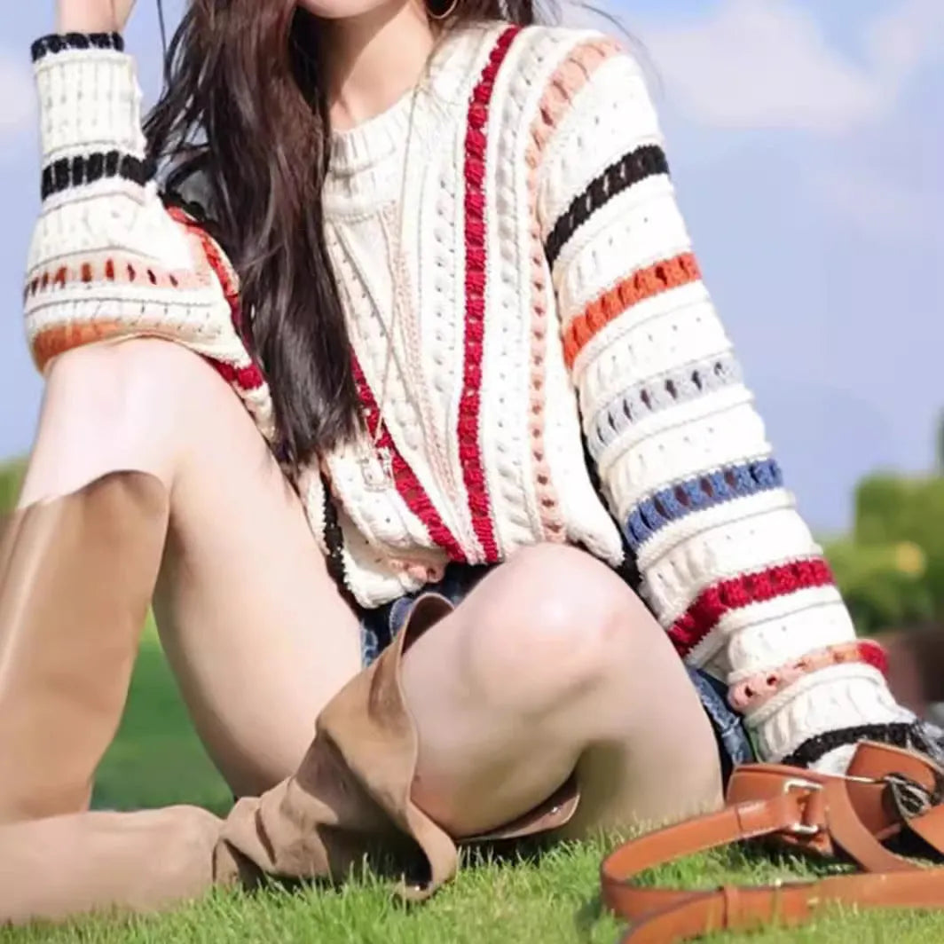 Retro rainbow striped hollow knit sweater with batwing sleeves and colourful thread detailing
