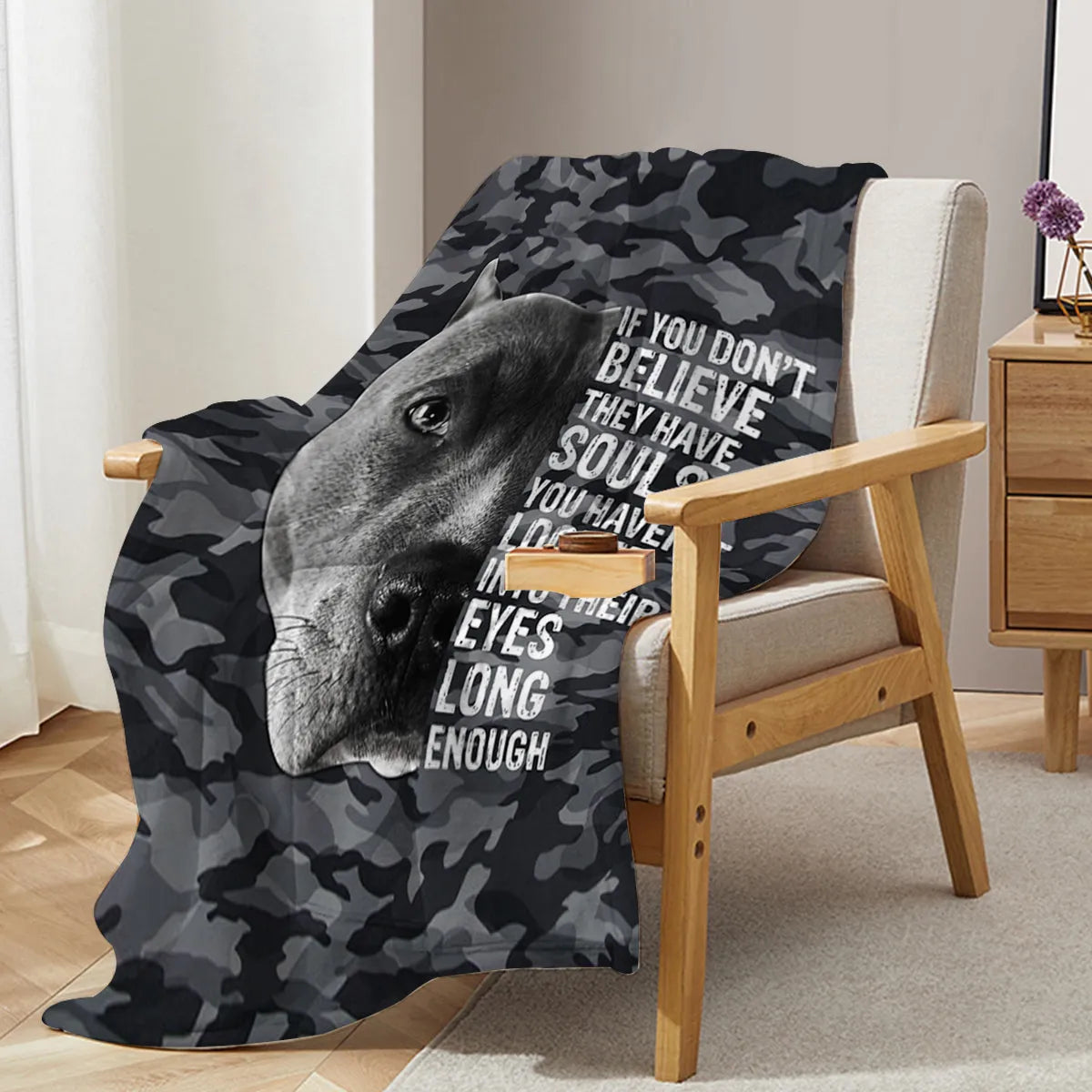Flannel black background dog pet theme soft printed blanket folded on a sofa