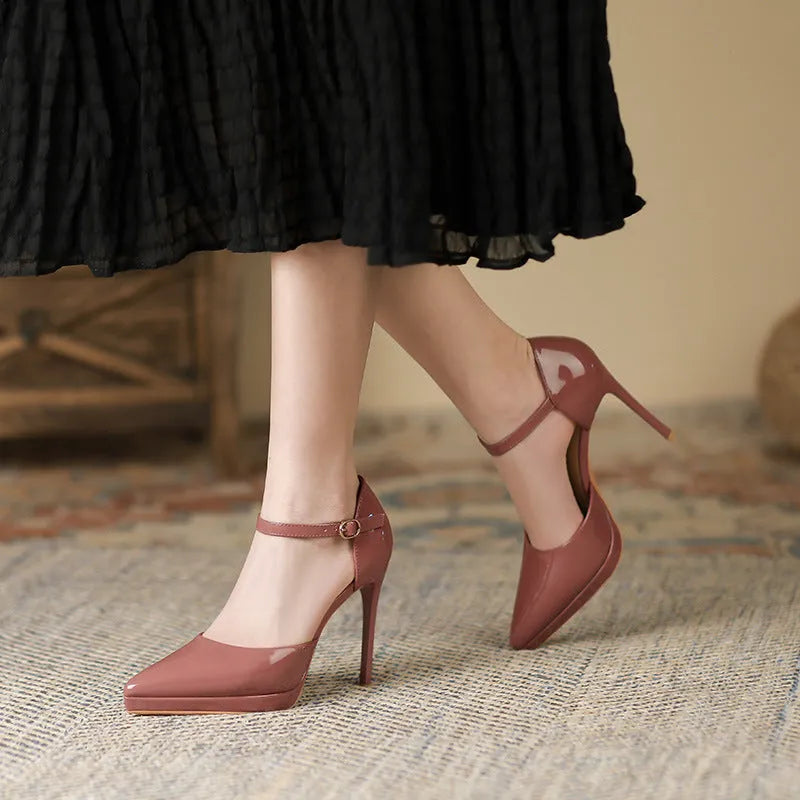 Pointed-toe platform high heels with 10.5cm stiletto heel in leather upper and hollow detail