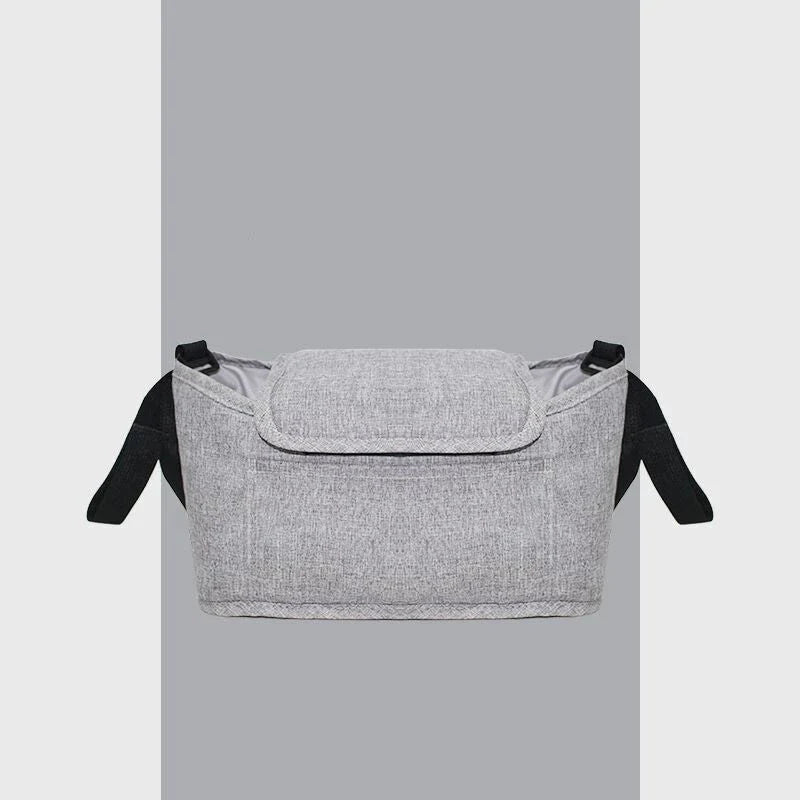 Stylish and functional stroller organizer bag with separate compartments, made of durable cotton and linen materials