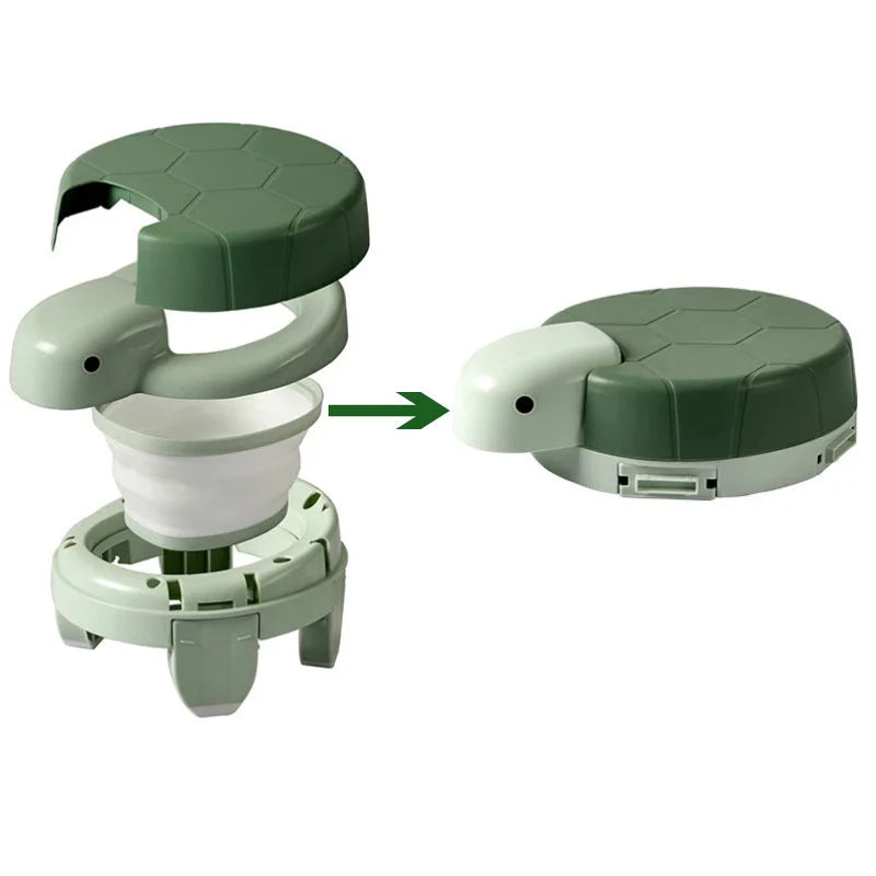 Children's portable folding training toilet with cute turtle design, ideal for potty training at home or on the go.