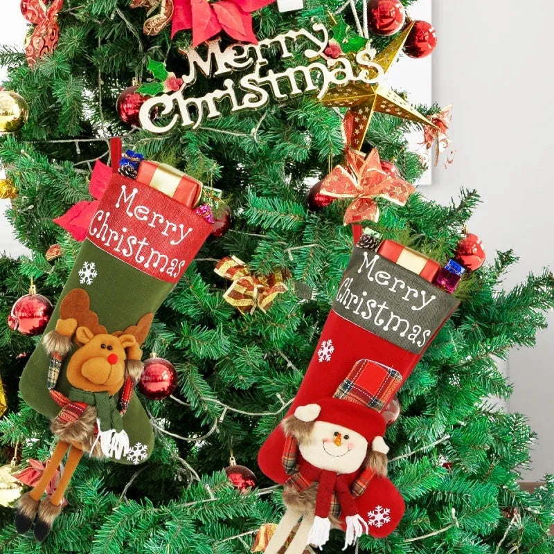 Three large Christmas stockings with Santa, Snowman, and Reindeer 3D applique designs hanging from a mantel