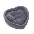Heart-shaped pet nest for cats or small dogs made of linen and Arctic wool available in grey and pink in three sizes