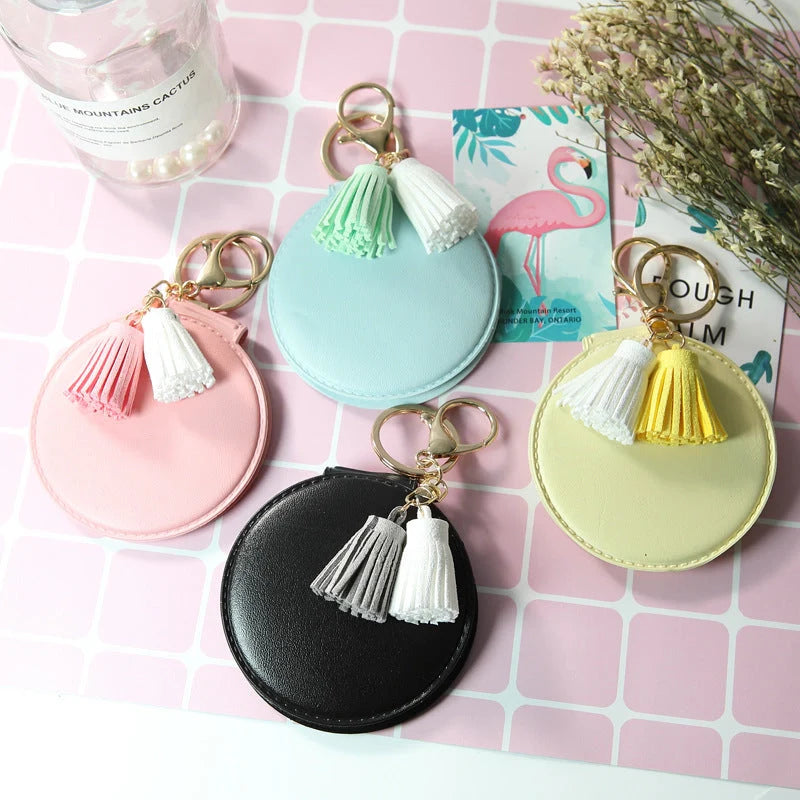 Mini round PU leather small mirror with tassel in various colours