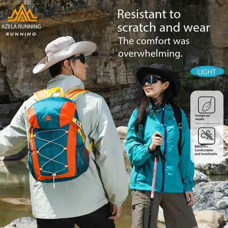 AZELA 20L Color Block Lightweight Hiking Backpack in orange and black, front view, on a rocky outdoor surface