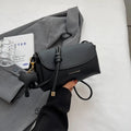 Soft PU leather small shoulder bag in khaki, pillow shape, 21cm width, with visible sewing thread details