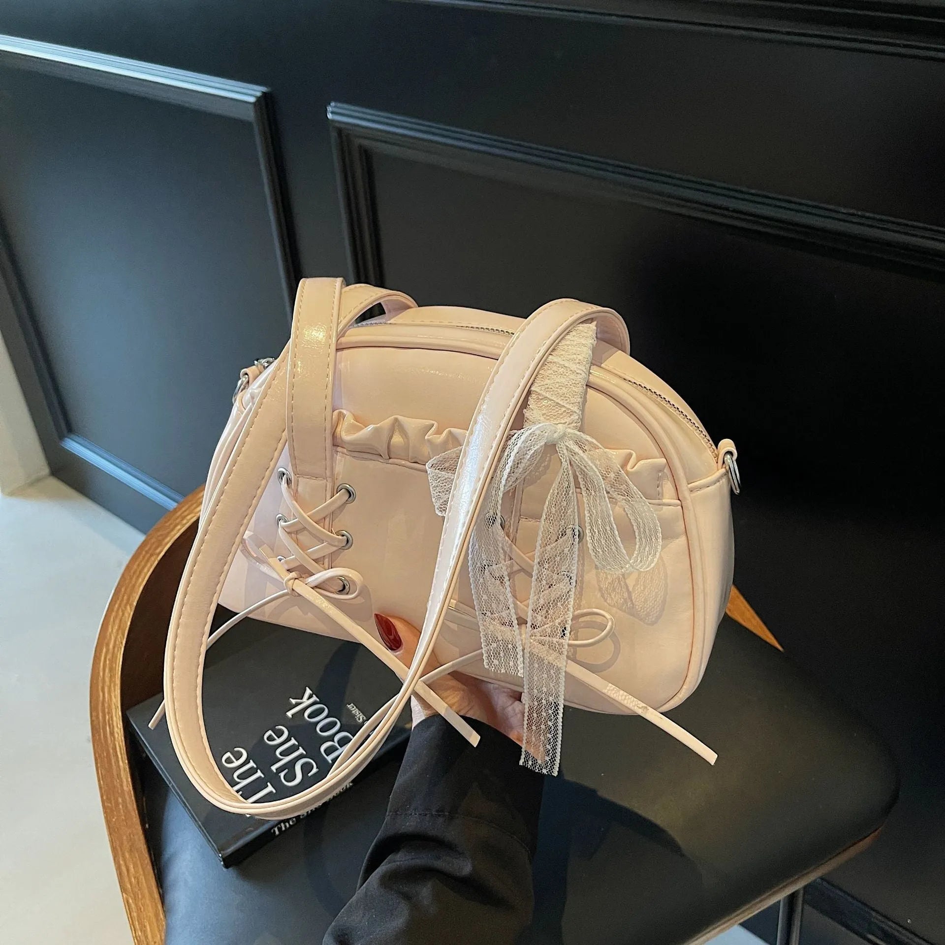 Women's casual PU bandage bow shoulder handbag with visible stitching, shown in milky white colour.