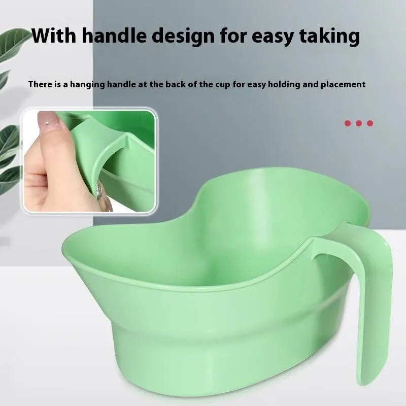 Green plastic nursing mouthwash cup with spout for bedridden patient oral care