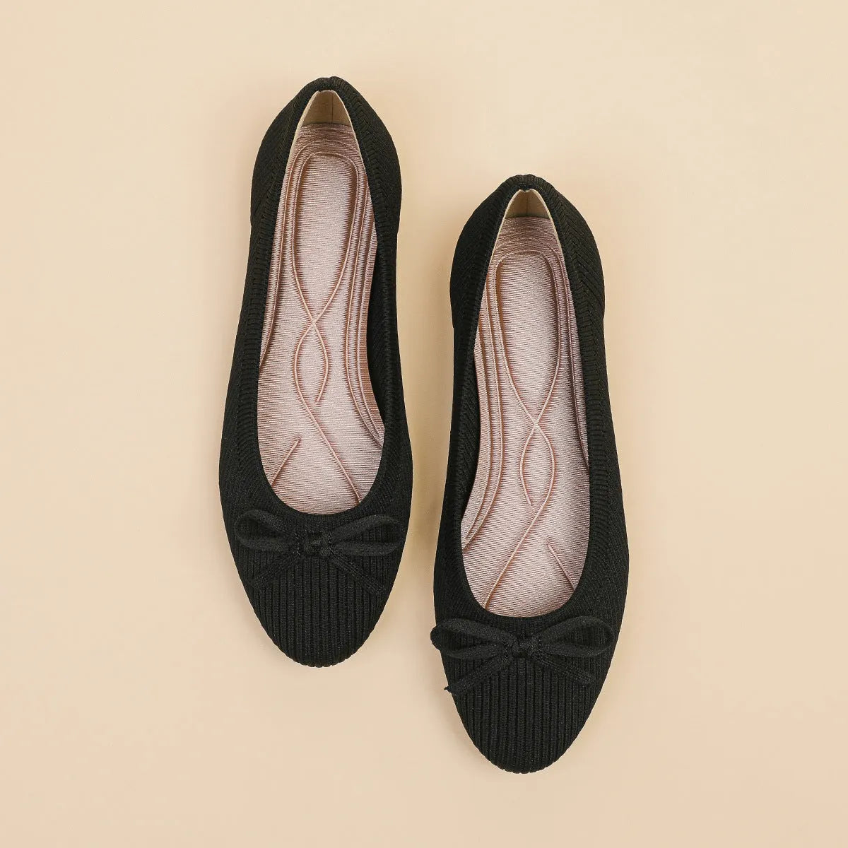 Women's flat pumps with bow decoration in round toe design available in butterfly colours
