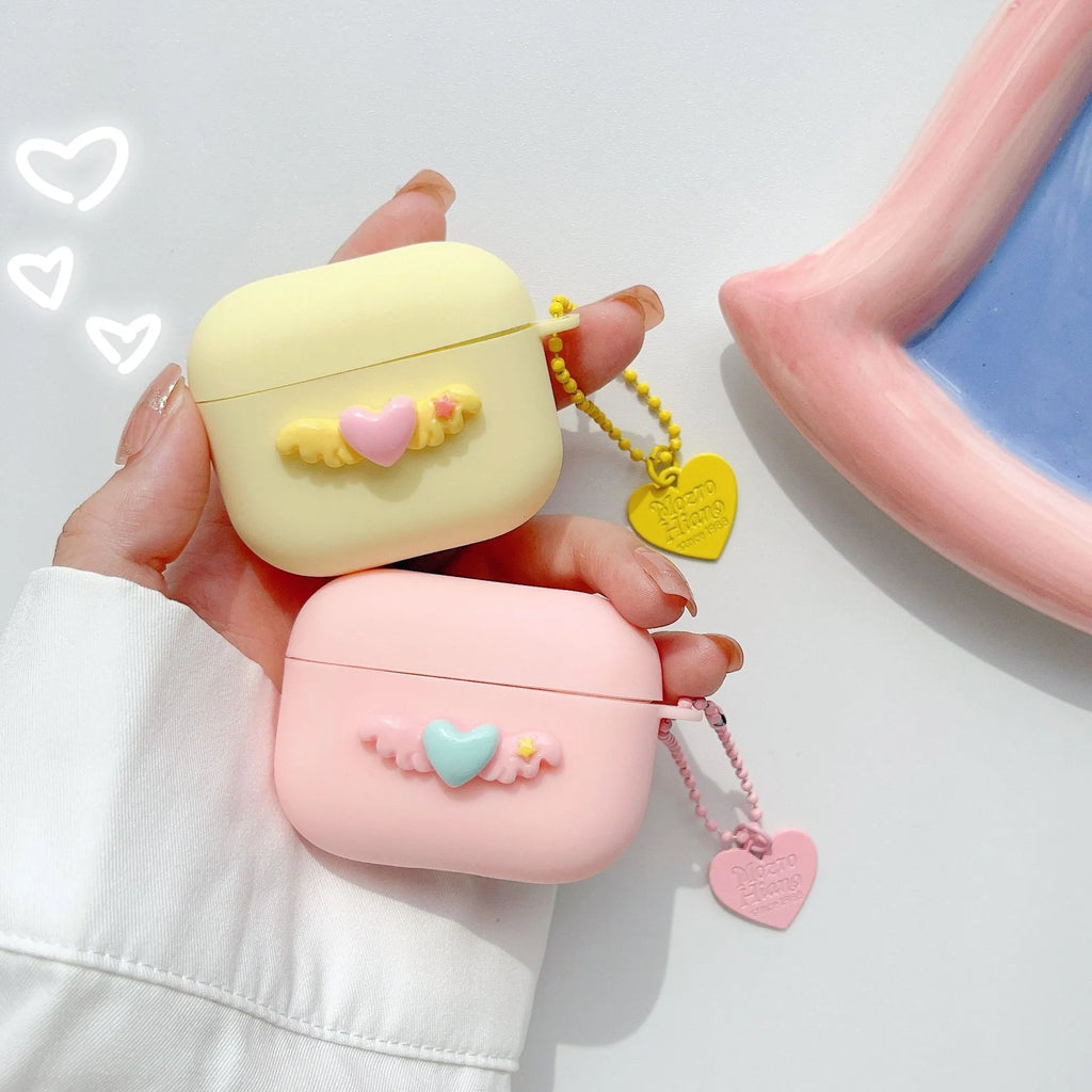 Heart Wings TPU protective case for AirPods with three-dimensional relief design in pink, purple, and yellow colours
