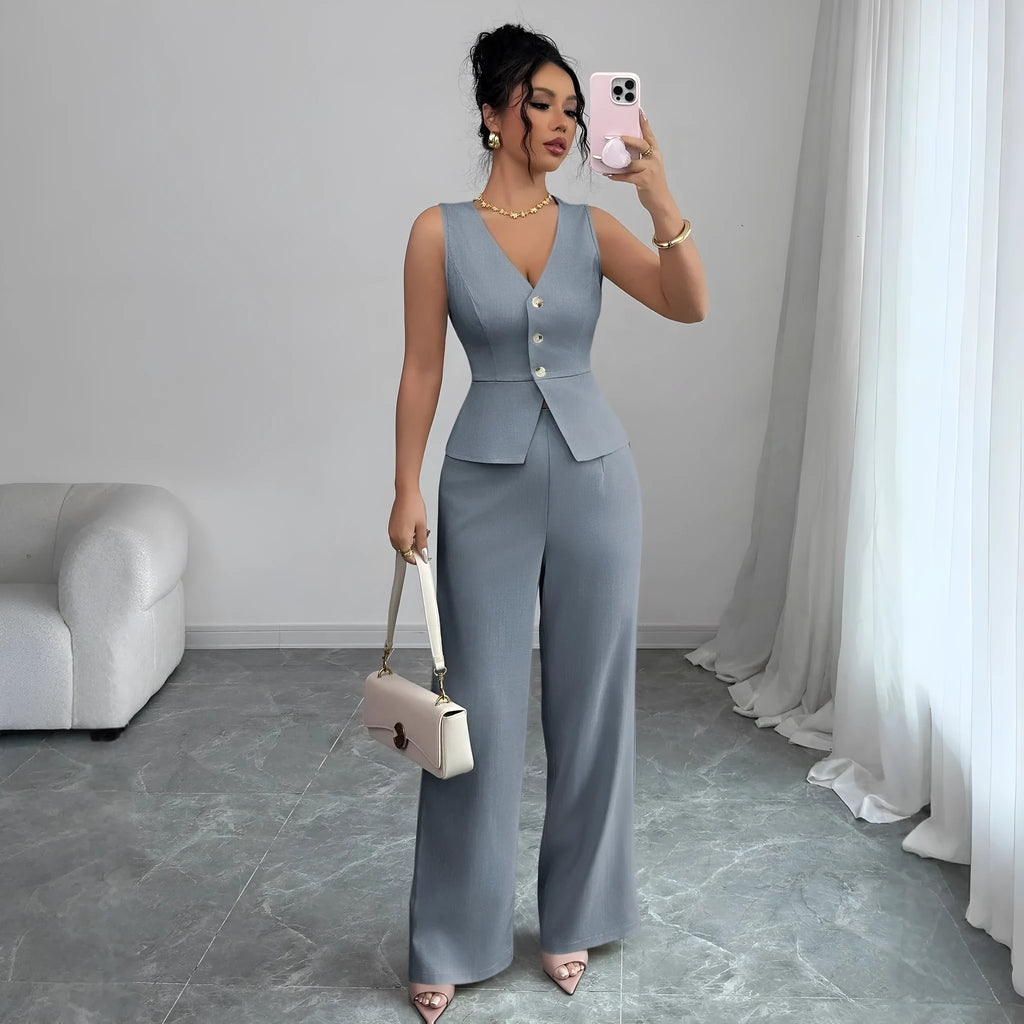 Women's sleeveless slim fit vest and high-waist trousers two-piece set in solid colour.