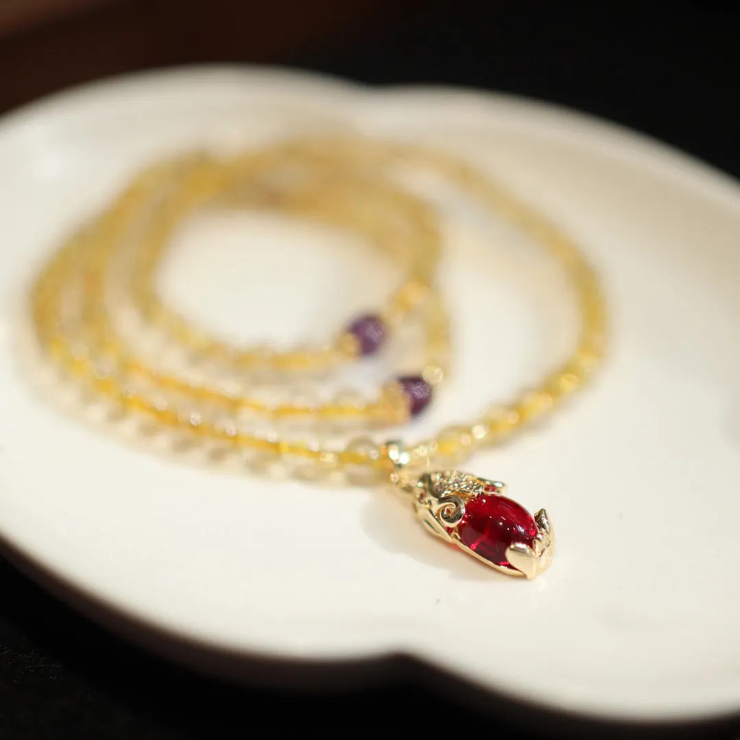 Natural Brazil rutilated quartz bracelet with golden needles and Chinese style hanging chopsticks design