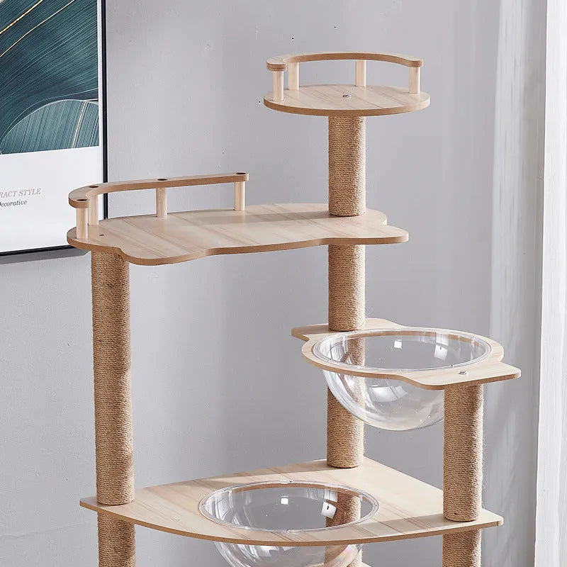 Plush cat climbing frame with nest and scratch board in indoor setting