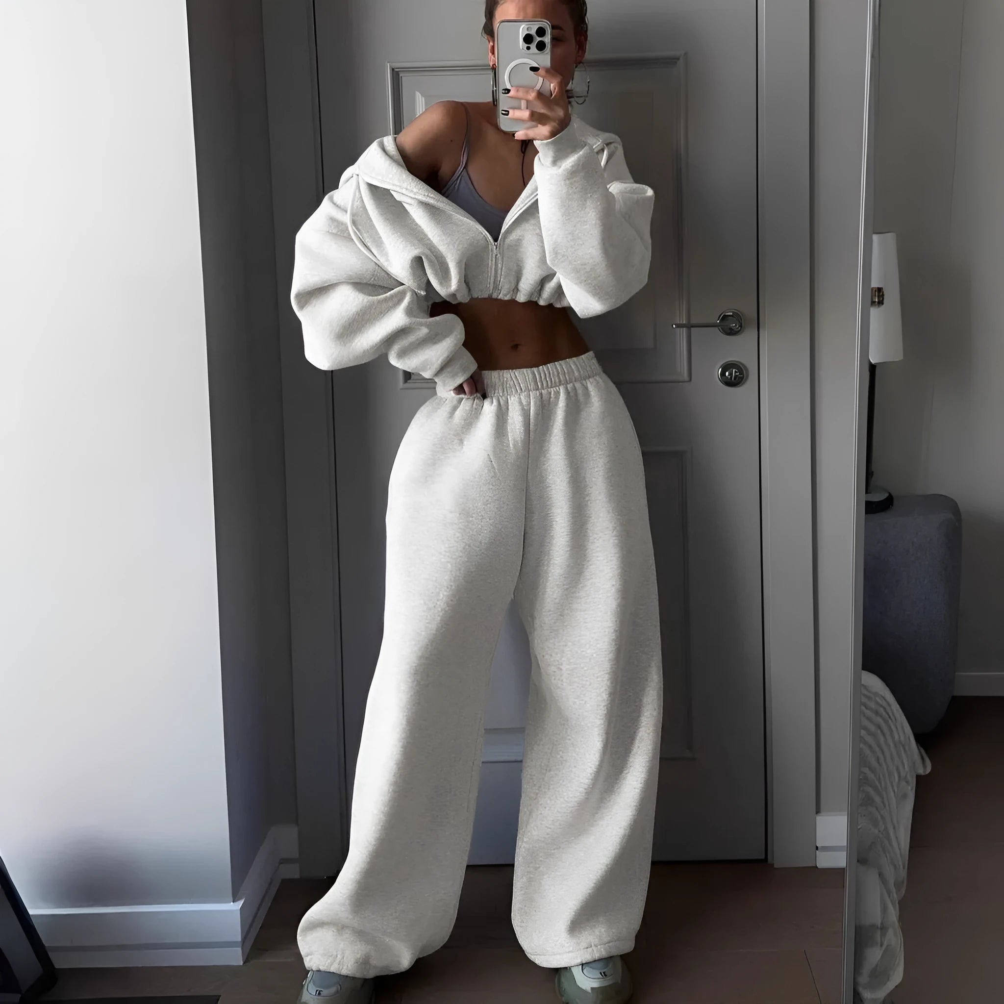 Long sleeve polyester sports leisure sweater suit two-piece set in a choice of seven colours.