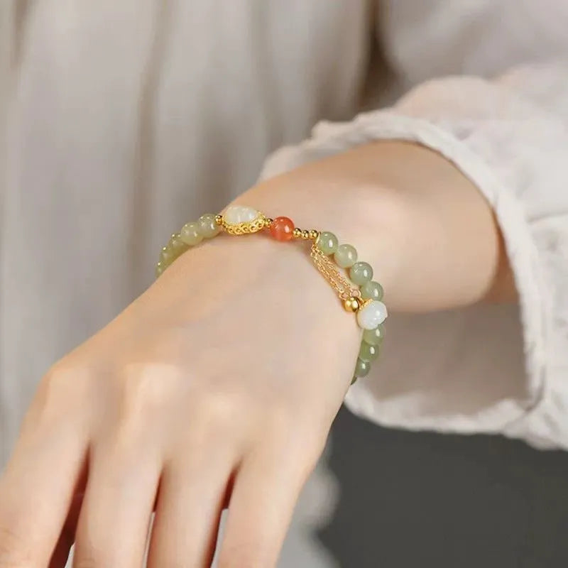 Jade women's bracelet with gold gourd sense design and fu character symbol, 6mm gold plated finish