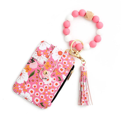 Women's floral print leather card bag in various colours, compact and stylish