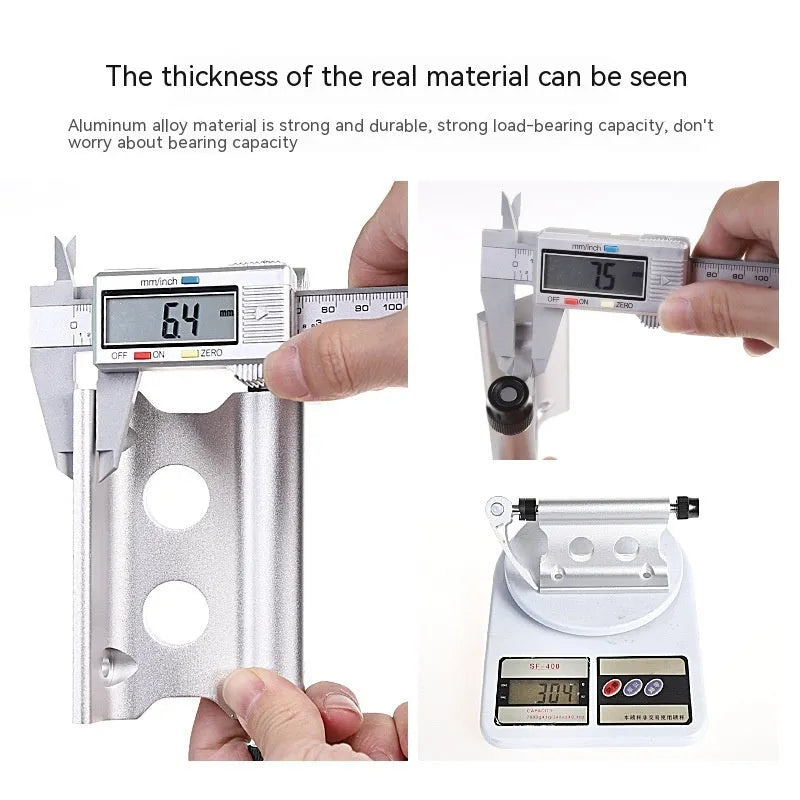 Silver metal quick release fixing clamp for mounting accessories on a bicycle front fork.