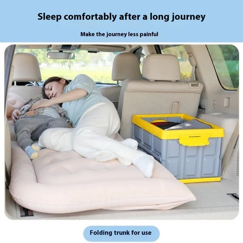 Beige SUV inflatable bed with flocking surface and car motor pump on vehicle floor