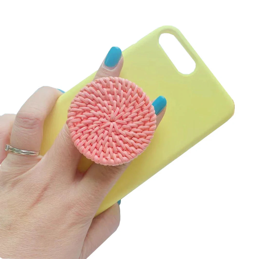 Bamboo woven telescopic phone stand extended to 25cm height holding smartphone