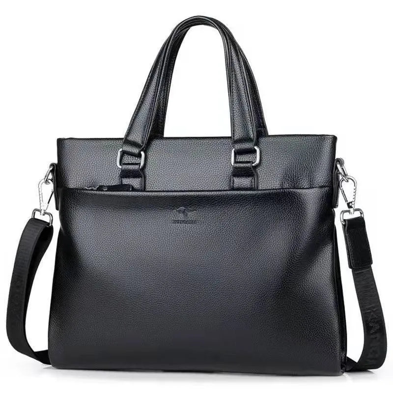 Men's black PU leather shoulder messenger bag with splicing detail on a table