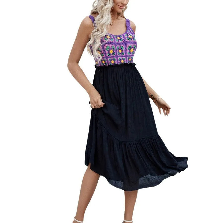 Purple sleeveless dress with detailed hand-hooked flower stitching on the fabric.