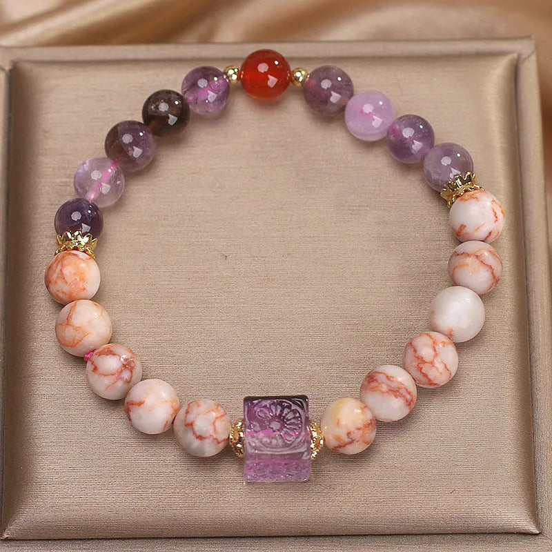 Natural agate bracelet in Amethyst Alashan colour for women, ethnic style on a light background