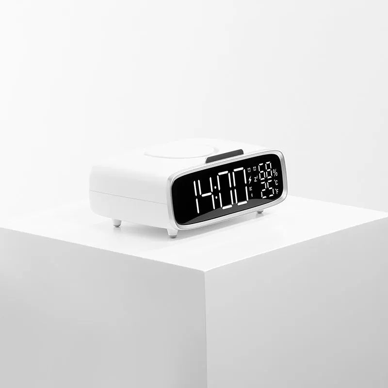 White round Bluetooth speaker wireless charger with night light function on bedside table