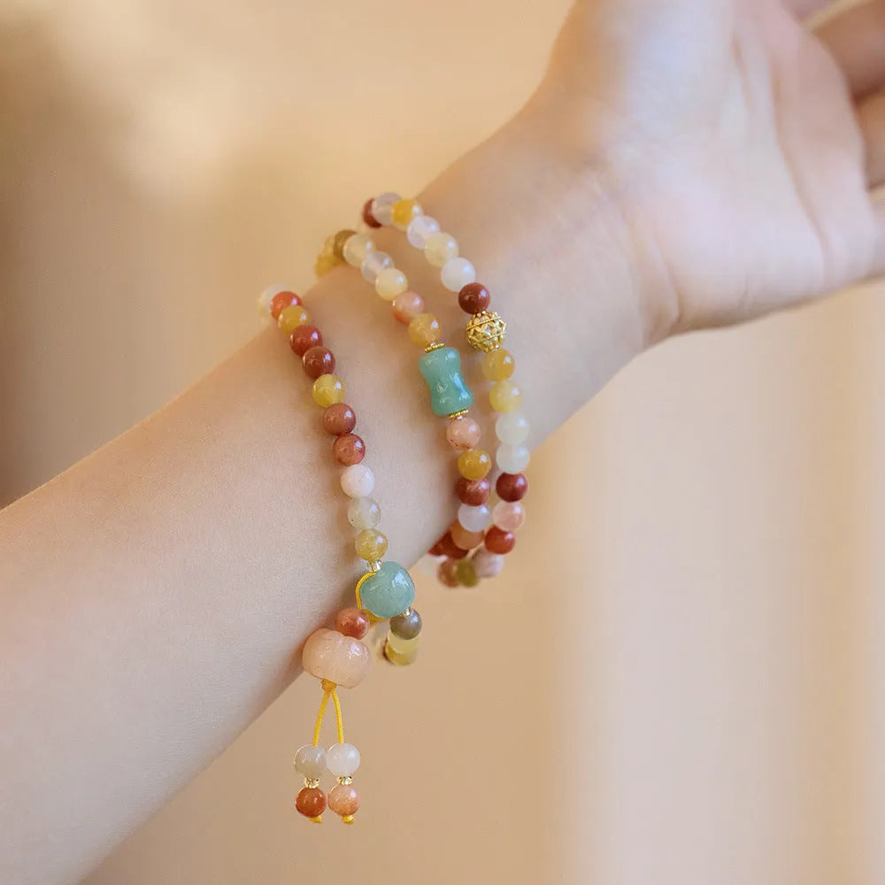 Women's three-circle pumpkin tassel bracelet in Jinsi Jade with national style design