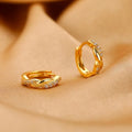 Gold and silver geometry-shaped interwoven hemp rope earclip earrings for women.