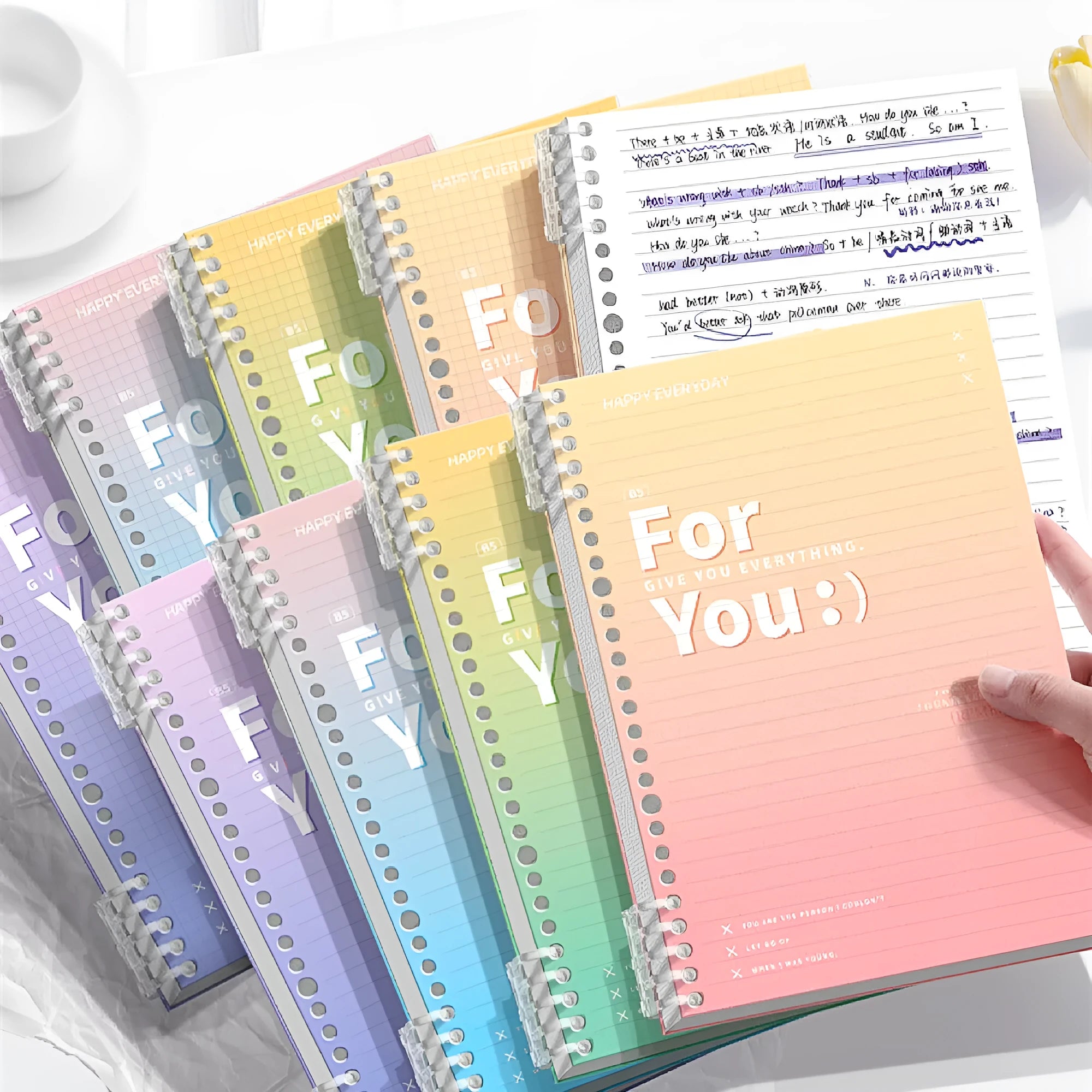 Removable coil gradient notepad in A4 and B5 sizes with green, blue, pink, and purple PP covers.