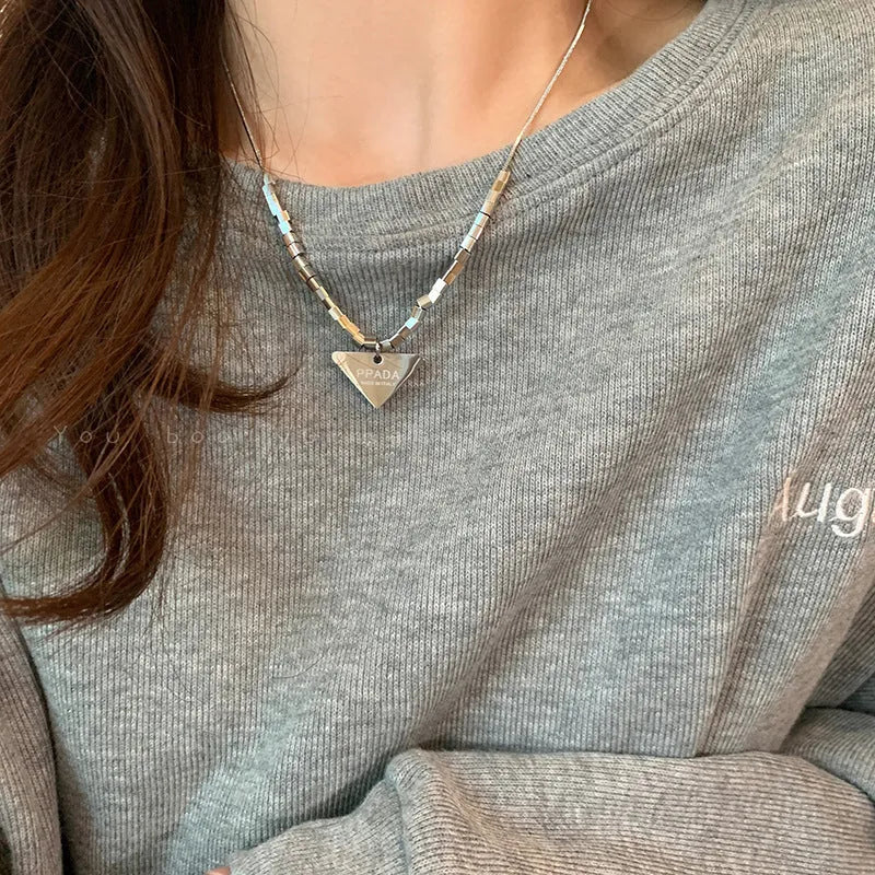 Women's double-layer necklace with geometric rhinestone pendant on alloy chain