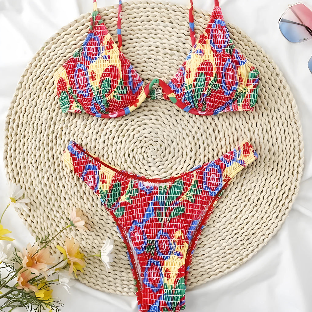 Red floral pattern women's underwire triangle bikini with briefs-style bottom on mannequin